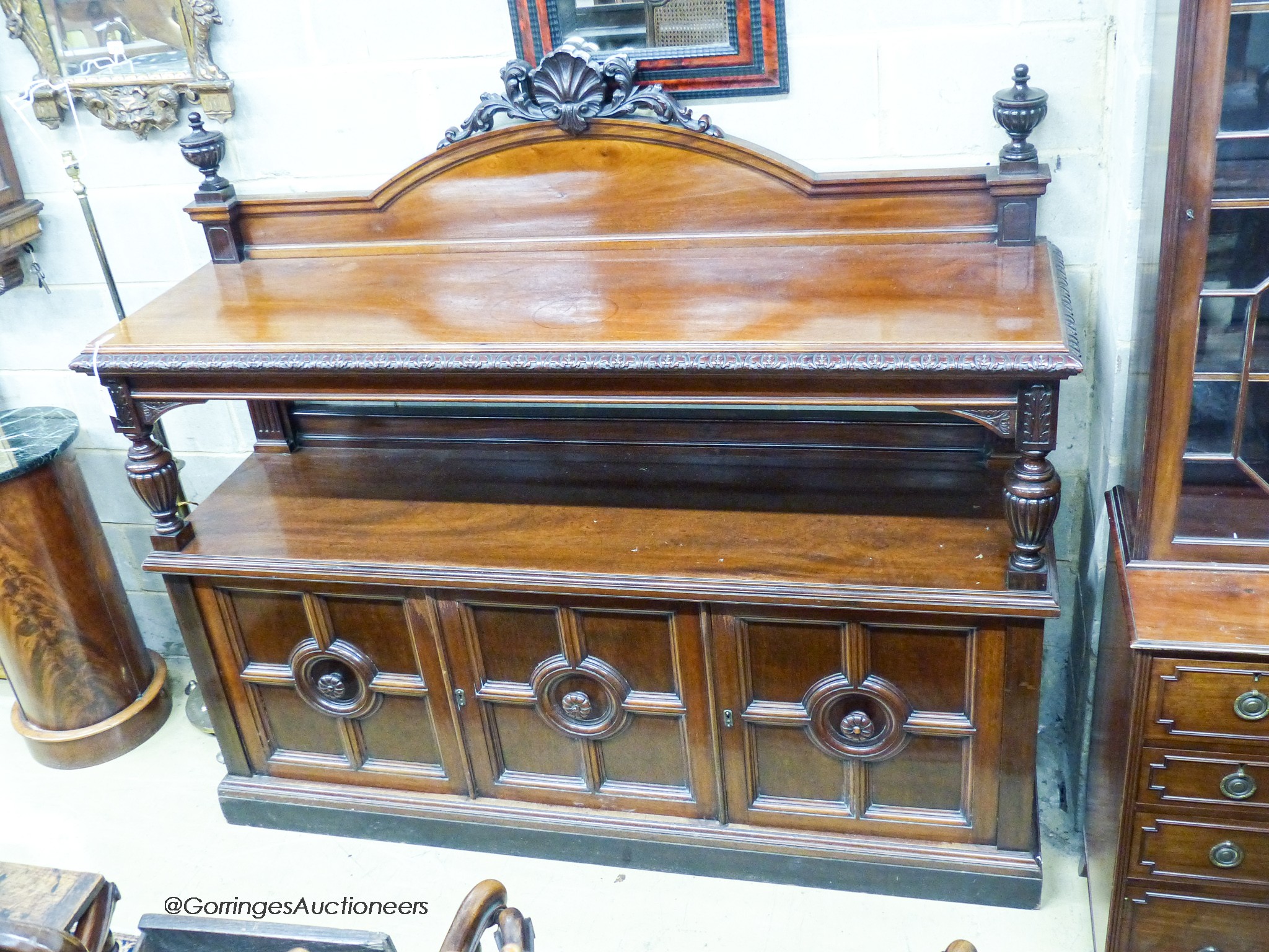 A Victorian Maple & Co. carved mahogany two tier buffet, length 182cm, depth 54cm, height 162cm
